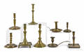 Nine brass candlesticks