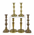 Three pairs of brass candlesticks