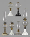 Six shield embossed oil lamps