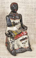 Cast iron Mammy and Child mechanical bank manufactured by Kyser  Rex