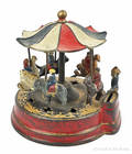 Cast iron MerryGoRound mechanical bank manufactured by Kyser  Rex