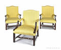 Three George III style mahogany open armchairs
