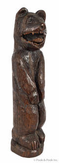 Carved wood standing bear