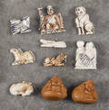 Eight Japanese carved ivory netsuke