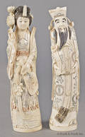 Two Chinese carved ivory figures of an emperor and a consort