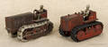 Two Arcade cast iron caterpillar tractors