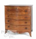 Hepplewhite cherry serpentine front chest of drawers