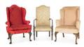 Two George II style mahogany wing chairs together with a Sheraton style lolling chair