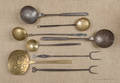 Eight wrought iron and brass kitchen utensils 19th c
