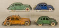 Four Hubley cast iron automobiles