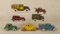 Seven cast iron automobiles