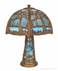 Spelter and slag glass table lamp