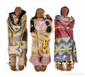 Three large Native American skookum display dolls