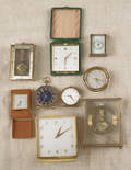 Nine assorted brass desk and travel clocks