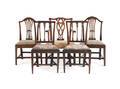 Five George III mahogany and yewwood dining chairs