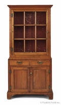 Diminutive butternut twopart wall cupboard ca 1800