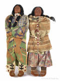 Two large Native American skookum display dolls