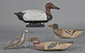 Three carved and painted wood duck decoys