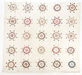 Pieced ships wheel quilt