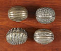 Four Birmingham silver nutmeg graters 19th c