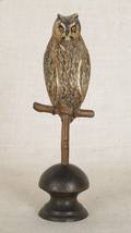 Carved and painted owl on a perch late 19th c