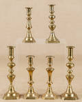 Six English brass candlesticks
