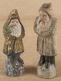 Two composition belsnickle Santa figures