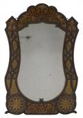 Carved folk art mirror