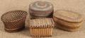 Four miniature Native American baskets