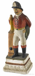 Chalkware figure of a fireman