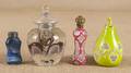 Four glass scent bottles