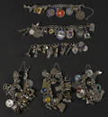 Six sterling charm bracelets