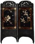 Chinese carved and ebonized dressing screen