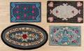 Four American floral hooked rugs