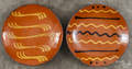 Two Greg Shooner redware plates