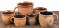 Six Pennsylvania redware crocks