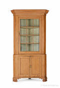Pennsylvania painted pine and poplar twopart corner cupboard ca 1810