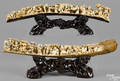 Pair of Chinese carved mastodon tusk bridges