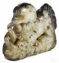 Chinese carved white and black jade figure