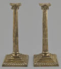 Pair of Georgian weighted silver ionic column candlesticks 17611762