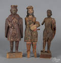Three carved and painted Santos figures
