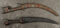 Two Middle Eastern curved blade daggers
