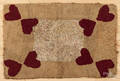 Hooked rug with heart corners