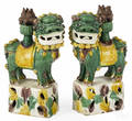 Pair of Chinese Qing dynasty Sancai glaze foo dog joss stick holders