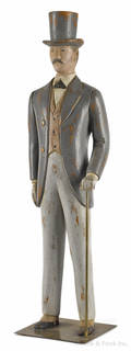 Carved and painted pine figure of a gentleman 20th c