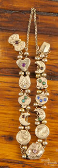 Slide bracelet consisting of twelve various gold and goldfilled watch chain slides