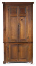 Pennsylvania walnut twopart corner cupboard late 18th c