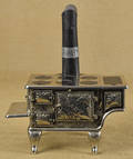 Ideal Mfg Co cast iron and tin  Baby  toy cook stove