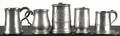 Five Continental pewter mugs