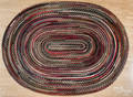 Large braided oval rug